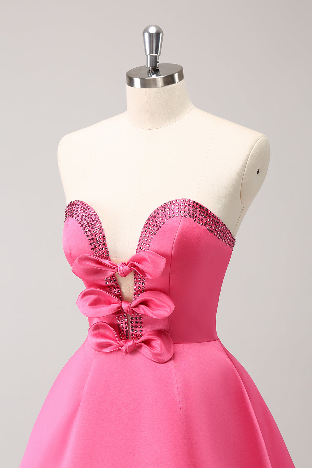 Glitrende Fuchsia A-linje Beaded Stroppeløs Homecoming Kjole med Sløyfer