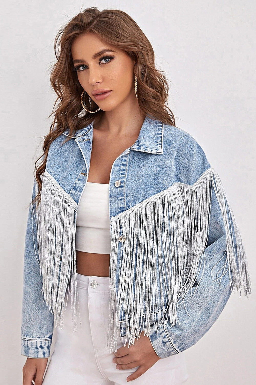 Blå denimjakke med frynser