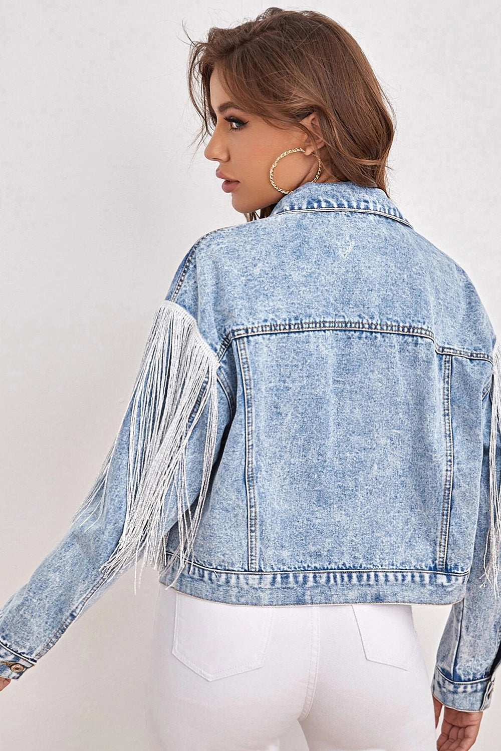 Blå denimjakke med frynser