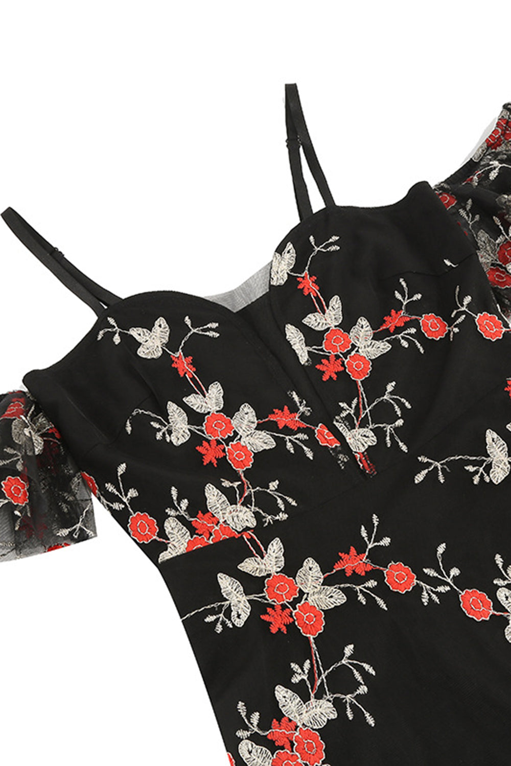 Av skulderblå kjole fra 1950-tallet med broderi