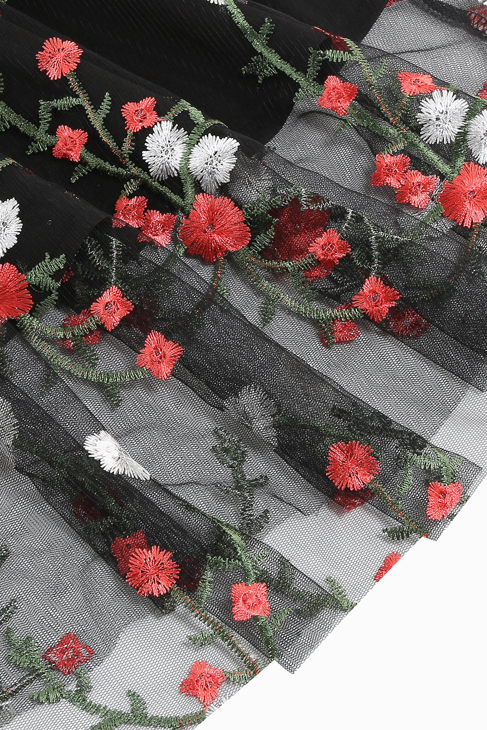 Svart Vintage 1950-tallskjole med broderi