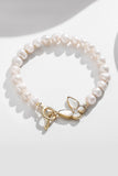 Sparkly White Pearl Stretch armbånd med sommerfugl
