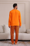 Oransje Halloween familiematchende pyjamassett