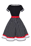 Svart V-hals Polka Dots 1950-tallet kjole