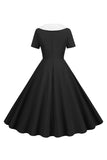 Peter Pan Collar Swing kjole fra 1950-tallet med korte ermer