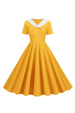 Peter Pan Collar Swing kjole fra 1950-tallet med korte ermer