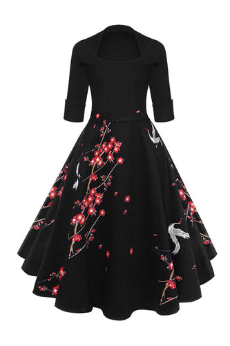 Svart blomsterkran trykt vintage kjole fra 1950-tallet