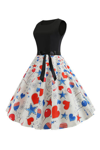 Svart trykt ermeløs kjole fra 1950-tallet med belte