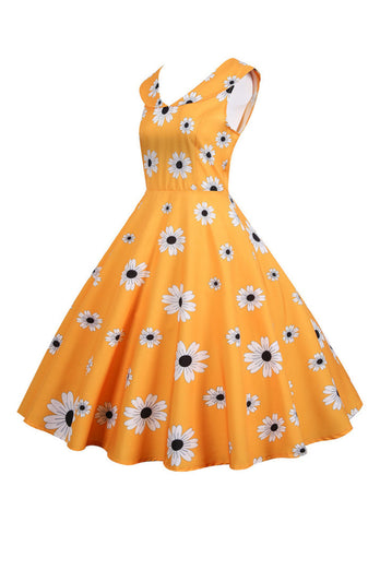 Ermeløs trykt gul kjole fra 1950-tallet