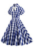 Load image into Gallery viewer, Rosa rutete sløyfeknute kjole fra 1950-tallet med korte ermer