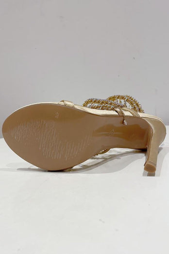 Gyldne glitrende strappy høyhælte sandaler med dusk