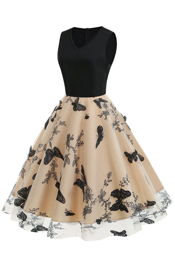 svart v-hals vintage 1950-tallet kjole med appliques