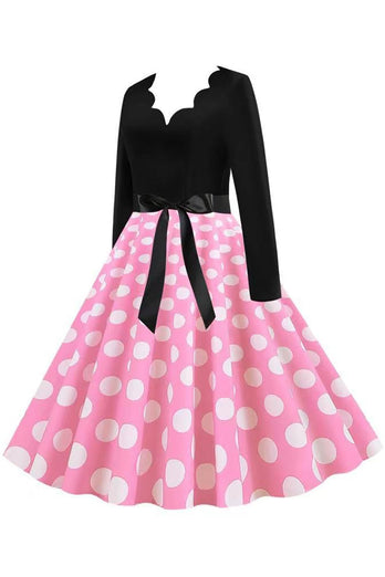 Polka prikker rosa lange ermer kjole fra 1950-tallet