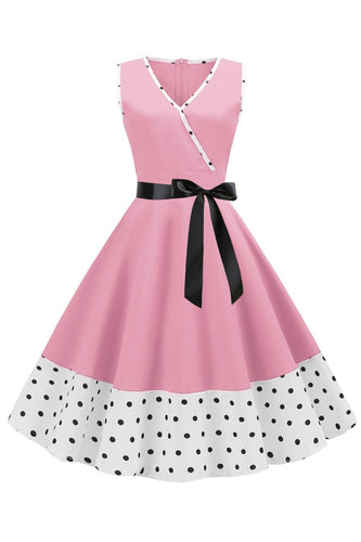 Rosa polka prikker ermeløs kjole fra 1950-tallet med sløyfeknute