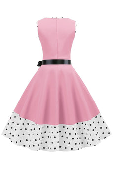 Rosa polka prikker ermeløs kjole fra 1950-tallet med sløyfeknute
